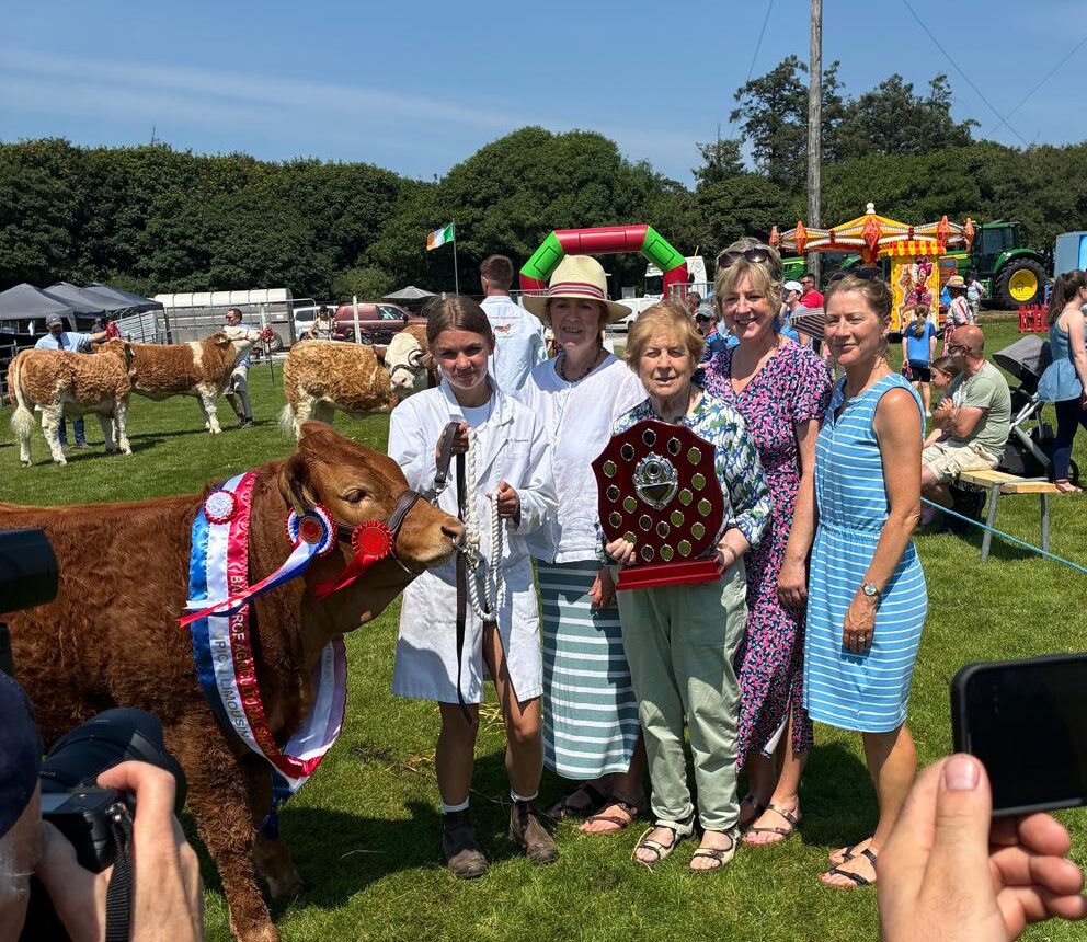 Champion Limousin being awarded the John Sexton Perpetual Shield Pictured is Champion Limousin being presented with the John Sexton Perpetual Shield by members of the family of the late John Sexton